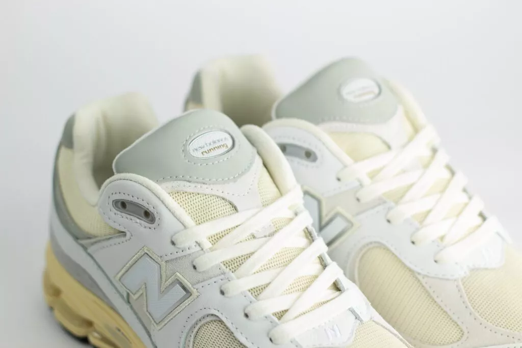 New Balance 2002R Vintage White – Wit/Beige/Grijs - Heren/Dames/Unisex Sneakers – Mesh/Leer/Suède - M2002RIA - Bovenkant
