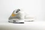 Nike Air Max 1 Essential Summit White University Gold – Beige/Wit/Geel – Heren/Dames/Uniseks Sneakers – Leer/Mesh - FZ5808-105 – Achterkant