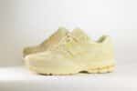New Balance 1906U Butter Yellow – Beige/Geel – Heren/Dames/Uniseks Sneakers – Mesh/Leer - M1906NK – Zijkant