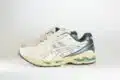 ASICS Gel-Kayano 14 Cream Obsidian Grey – Beige/Grijs – Heren/Dames/Uniseks Sneakers – Leer/Mesh – 1203A537-113 – Zijkant
